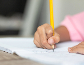  This is a photo of a child writing