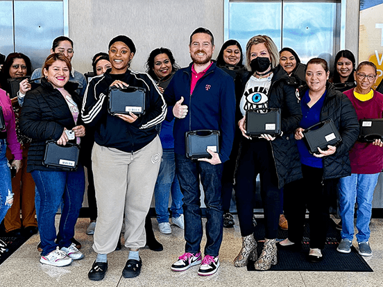 Photo of students getting gift of free internet access