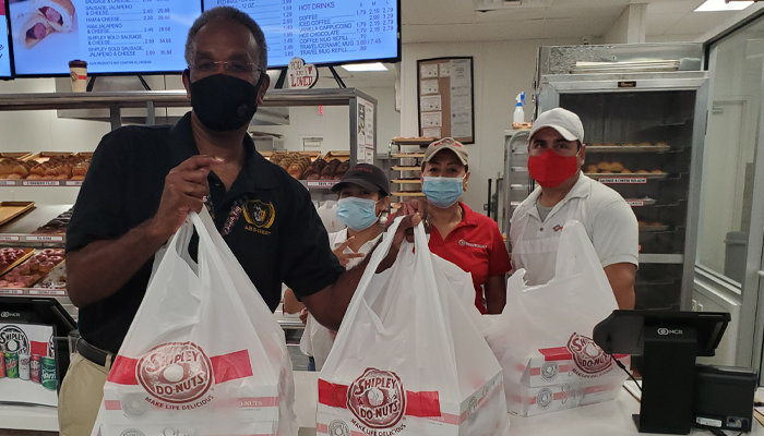 June 4, 2021 - ABS West Celebrates Donut Day with Firefighters, staff, and principal, Dr. Victor Keys.