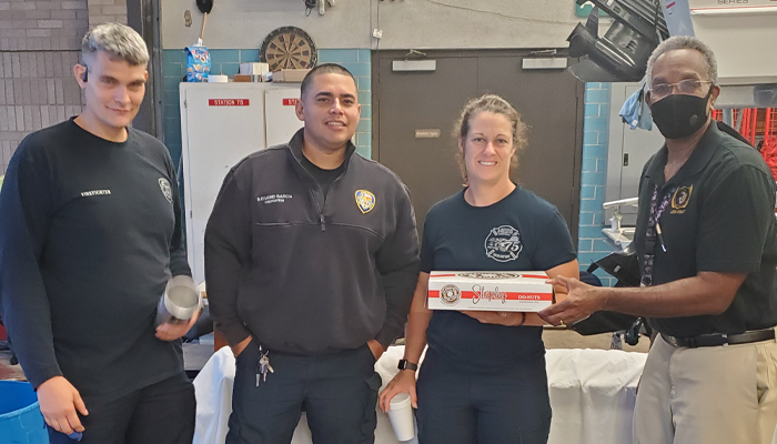 June 4, 2021 - ABS West Celebrates Donut Day with Firefighters, staff, and principal, Dr. Victor Keys.
