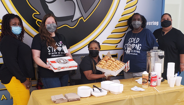 June 4, 2021 - ABS West Celebrates Donut Day with Firefighters, staff, and principal, Dr. Victor Keys.